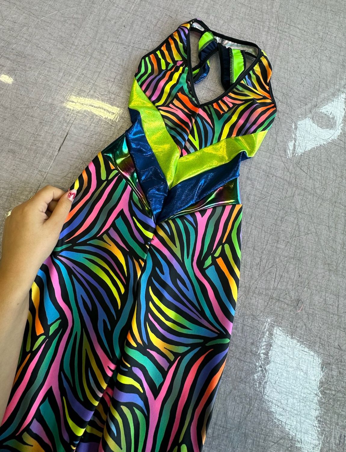 Multi coloured zebra print lycra catsuit.