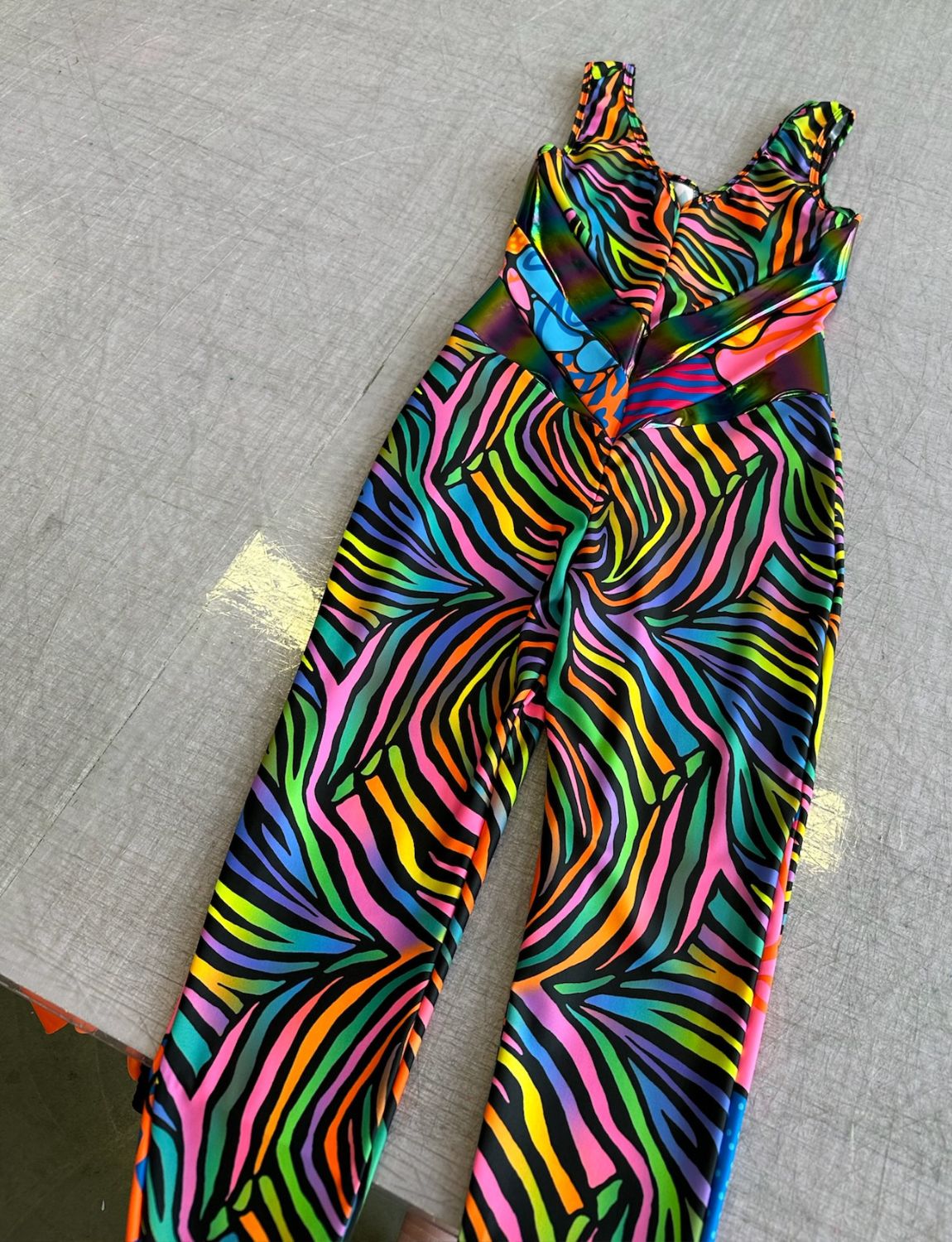 Rainbow zebra print lycra catsuit.