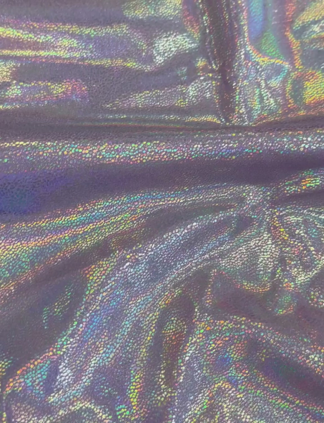 Lilac holographic foil spandex fabric.