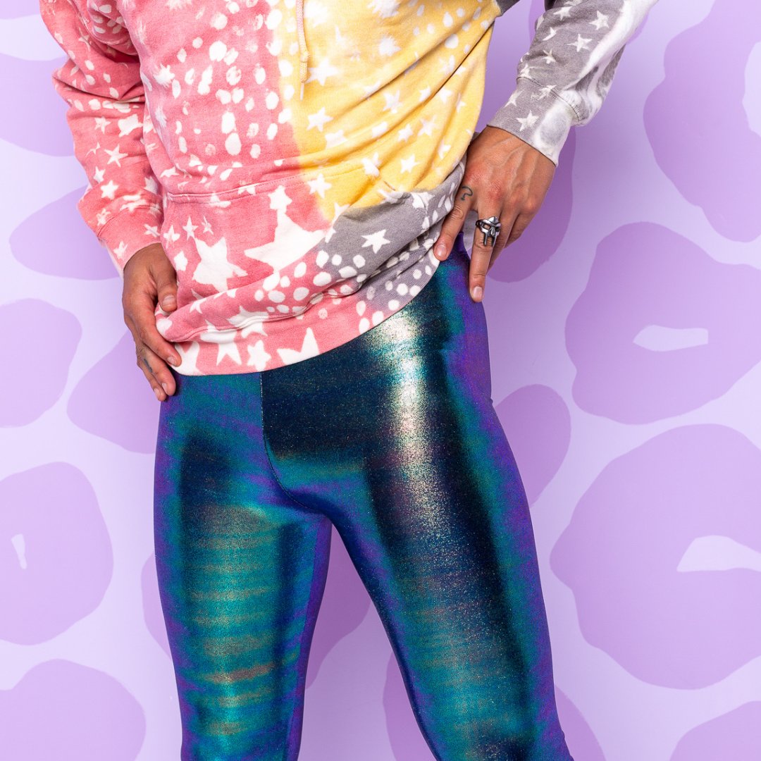 Man wearing iridescent leggings