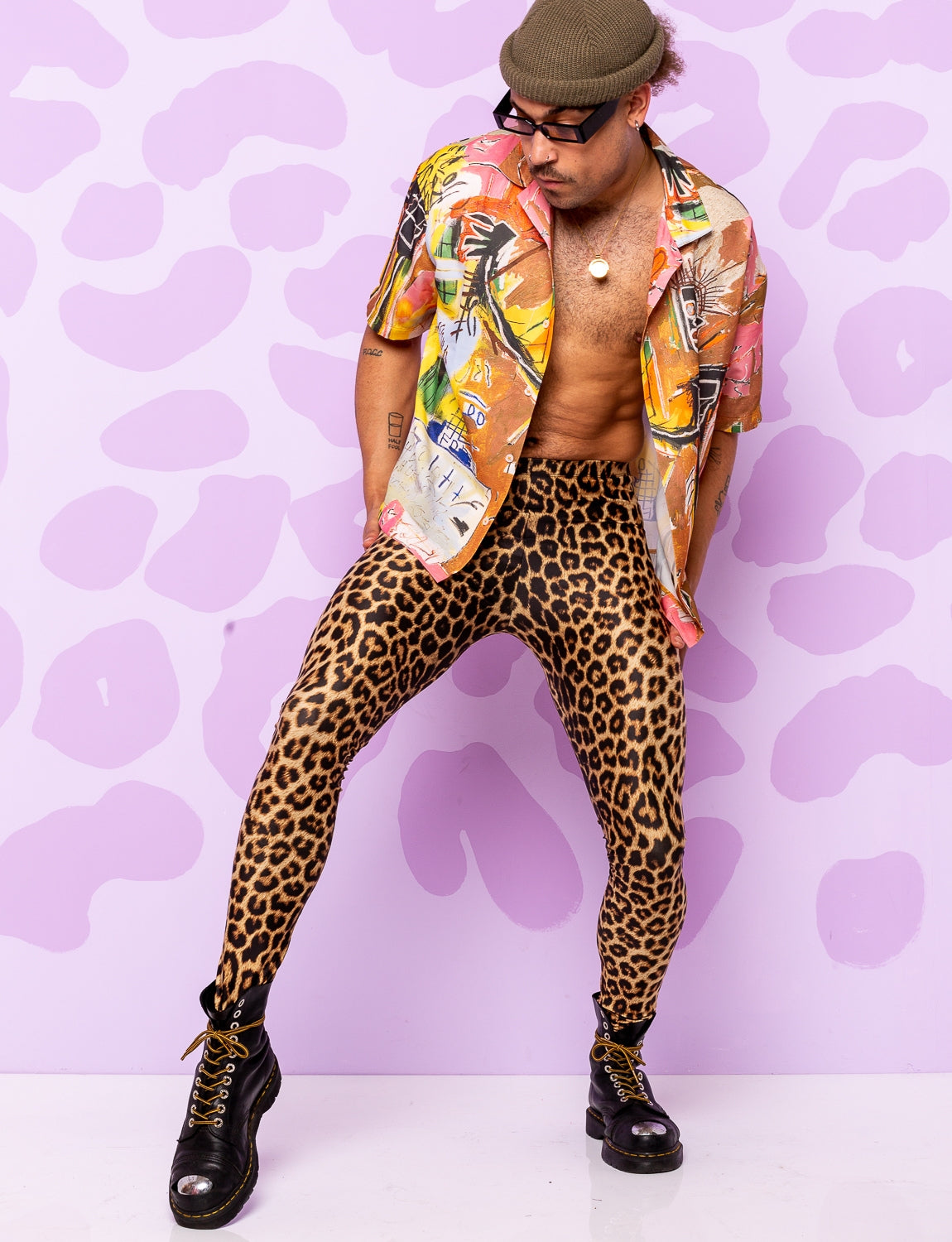 man wearing leopard print lycra leggings