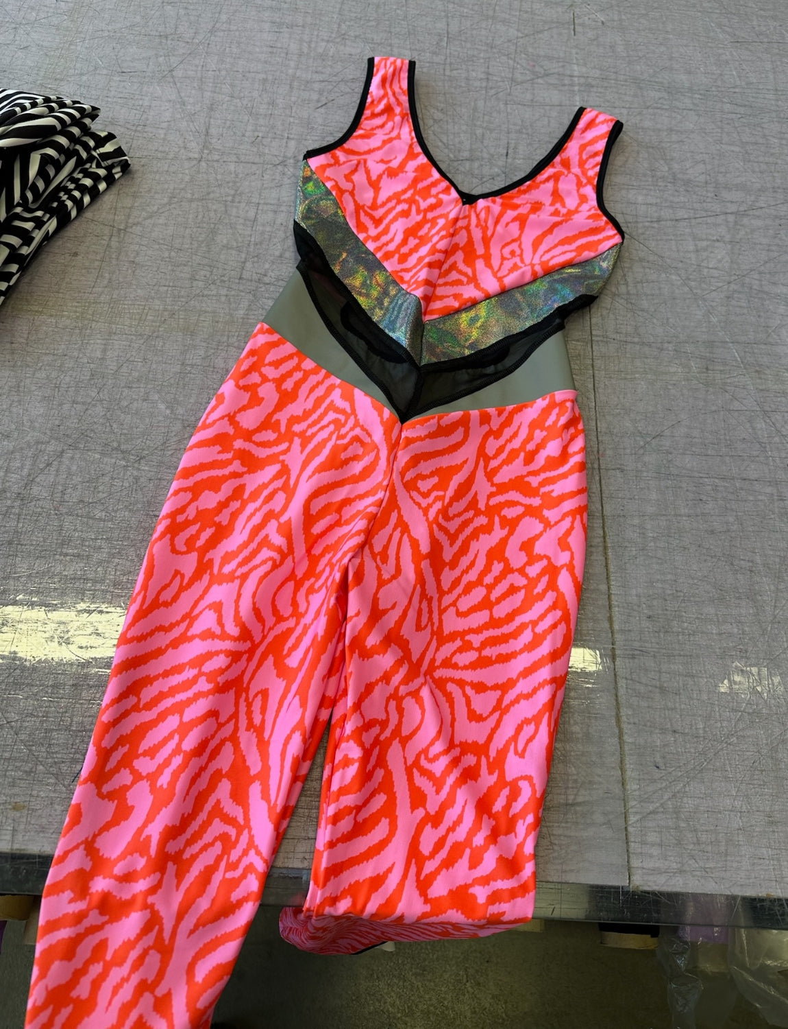 pink patterned lycra panelled catsuit