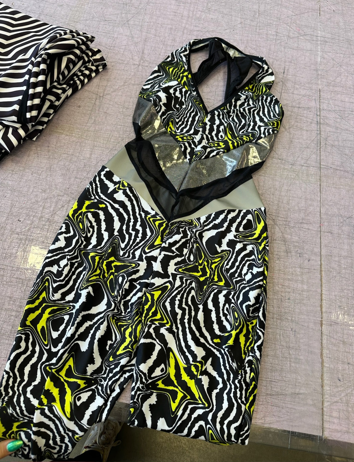 lycra catsuit in texas yellow and black star print