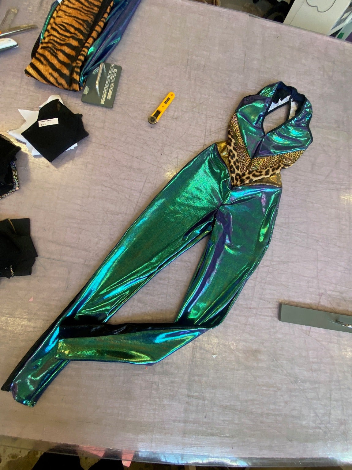 metalic green lycra backless catsuit with leopard print and gold panels
