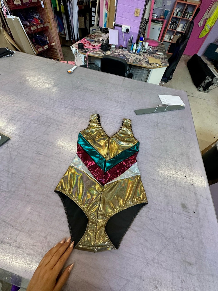 gold, berry and turquoise metallic lycra leotard