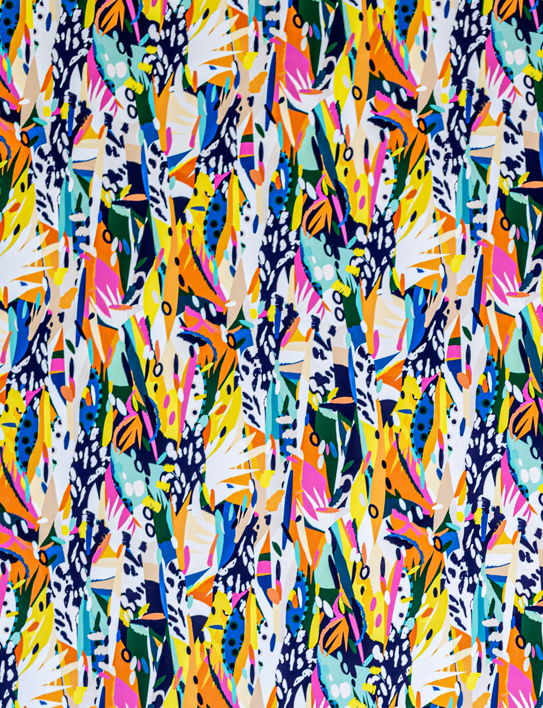 Wilderness print fabric with muti coloured shapes and textures.