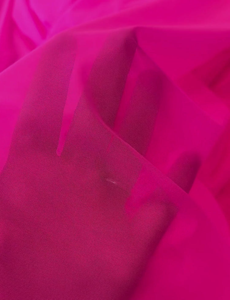 Neon pink mesh stretch fabric.
