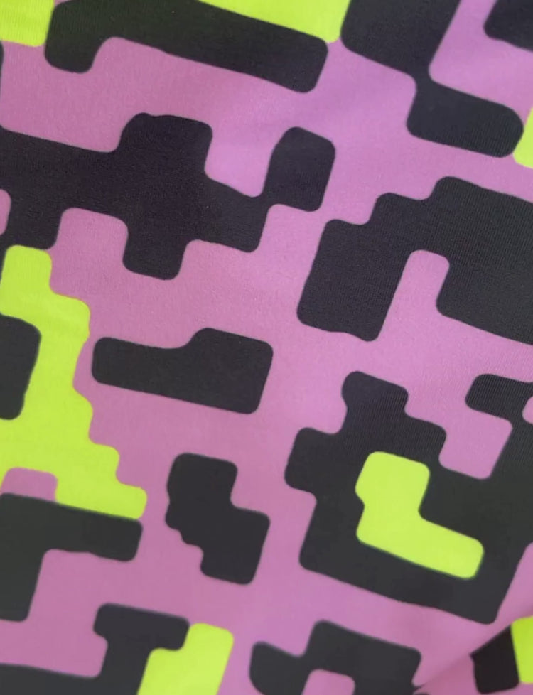 Lilac and lime green patterned lycra.