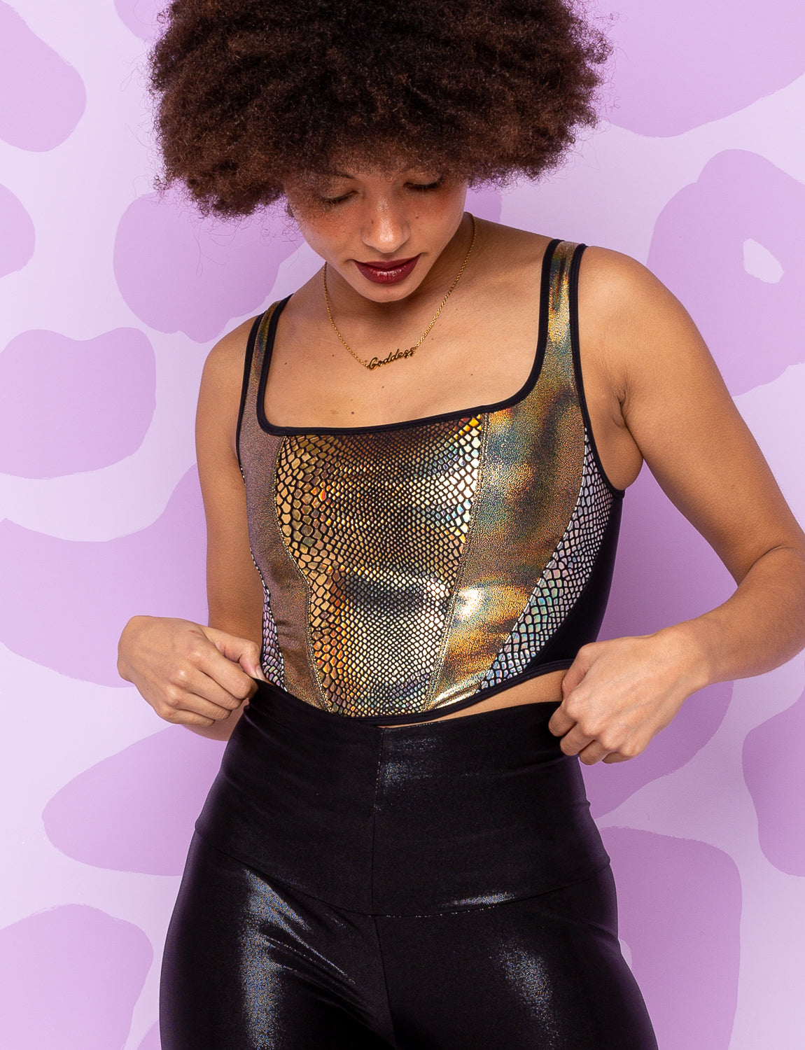 Lady modelling a Gold holographic snake print panelled bodice top