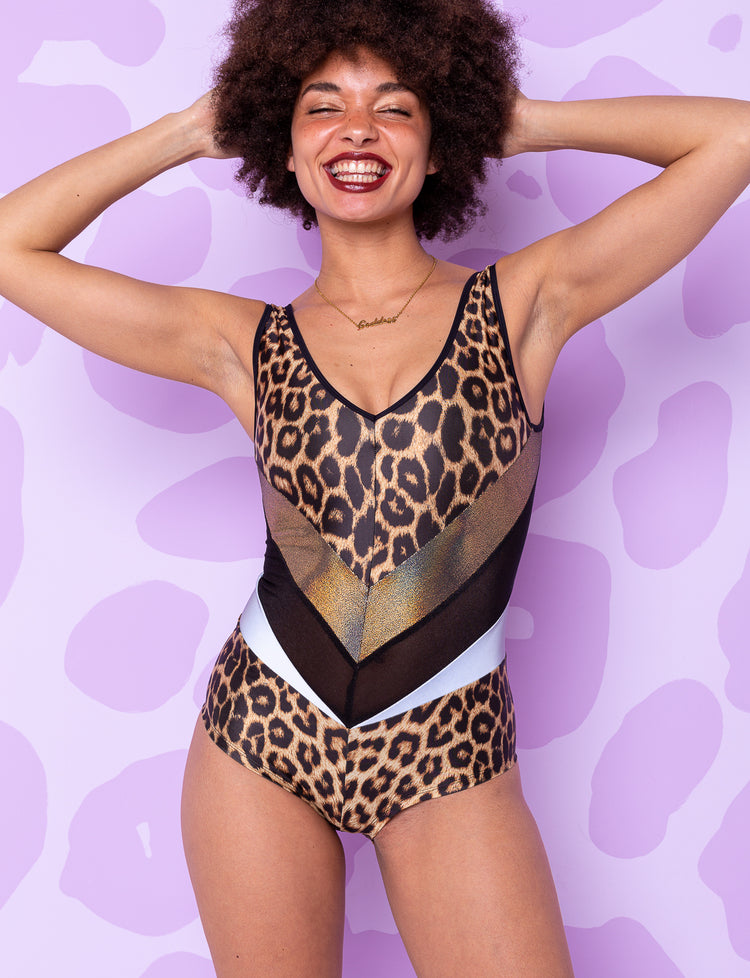 Lady in leopard print panelled bodysuit