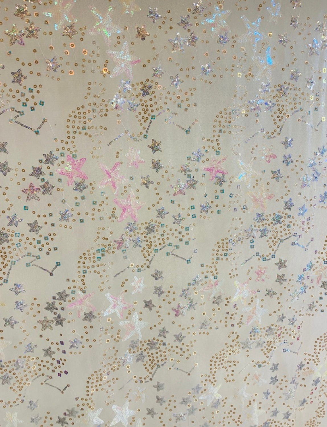 beige star sequin fabric swatch